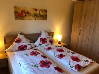 Ein Bett oder Betten in einem Zimmer der Unterkunft Waldhaus-Vulkaneifel