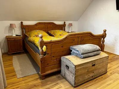 Ein Bett oder Betten in einem Zimmer der Unterkunft Ferienhaus Göbel´s gute Stube