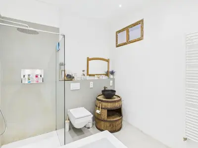 Ein Badezimmer in der Unterkunft Sam's Cottage Suite