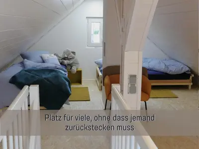 Ein Bett oder Betten in einem Zimmer der Unterkunft Ferienhaus Däschinger Der goldene Mond