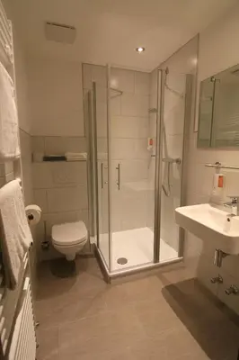 Ein Badezimmer in der Unterkunft Hotel Klasen