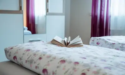 Ein Bett oder Betten in einem Zimmer der Unterkunft Haus Avallon