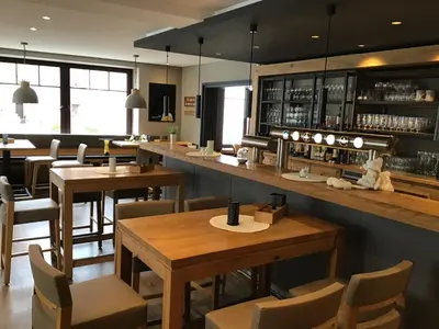Ein Restaurant oder anderes Speiselokal in der Unterkunft Hotel zum Stern