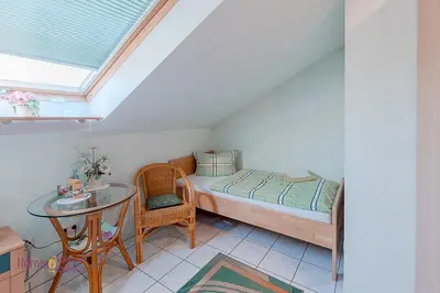 Ein Bett oder Betten in einem Zimmer der Unterkunft Ferienwohnung Hörning