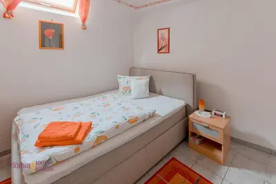 Ein Bett oder Betten in einem Zimmer der Unterkunft Ferienwohnung Hörning