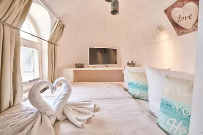 Ein Bett oder Betten in einem Zimmer der Unterkunft Iglu Camp Fachbach