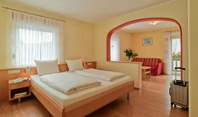 Ein Bett oder Betten in einem Zimmer der Unterkunft Gästehaus Lenartz-Beth