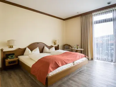 Ein Bett oder Betten in einem Zimmer der Unterkunft Landhaus Müllenborn