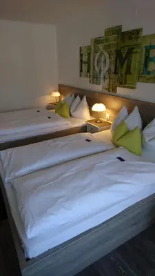 Ein Bett oder Betten in einem Zimmer der Unterkunft Hotel Deutschherrenhof