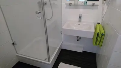 Ein Badezimmer in der Unterkunft Hotel Deutschherrenhof