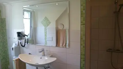Ein Badezimmer in der Unterkunft Haus Hohenzollern & Haus 'Ambiente
