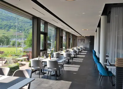 Ein Restaurant oder anderes Speiselokal in der Unterkunft Boutique Hotel Moselgarten