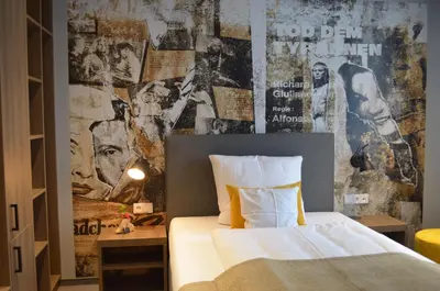 Ein Bett oder Betten in einem Zimmer der Unterkunft Boutique Hotel Moselgarten