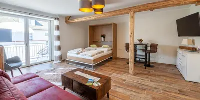 Ein Bett oder Betten in einem Zimmer der Unterkunft Ferienwohnungen Hof Krebs