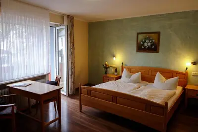 Ein Bett oder Betten in einem Zimmer der Unterkunft Gästehaus Kickert
