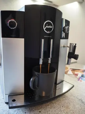 Kaffee-/Teezubehör in der Unterkunft Gemütliche Wohnung im Zentrum, Kaffeevollautomat, Smart TV