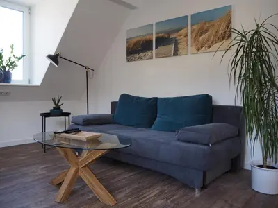 Ein Sitzbereich in der Unterkunft Gemütliche Wohnung im Zentrum, Kaffeevollautomat, Smart TV