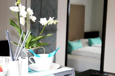 Ein Bett oder Betten in einem Zimmer der Unterkunft Koblenz Valley Hotel by Belvilla