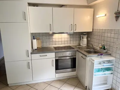 Küche/Küchenzeile in der Unterkunft Malerisches Ferienhaus in Reil