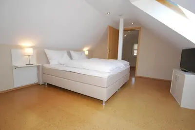 Ein Bett oder Betten in einem Zimmer der Unterkunft Hotel Heimatherz