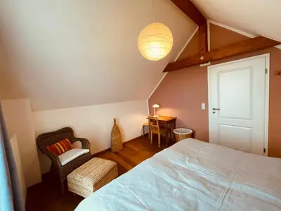 Ein Bett oder Betten in einem Zimmer der Unterkunft Ferienwohnung „Klein aber fein“