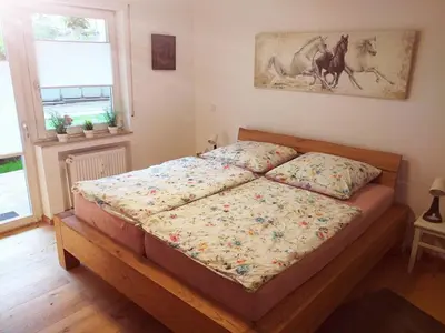 Ein Bett oder Betten in einem Zimmer der Unterkunft Ferienwohnung Am Michelsbach