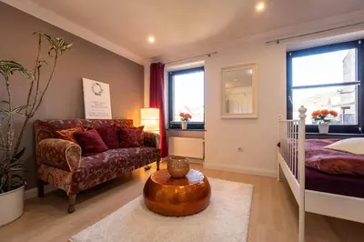 Ein Bett oder Betten in einem Zimmer der Unterkunft Green Valley Lounge Apartment