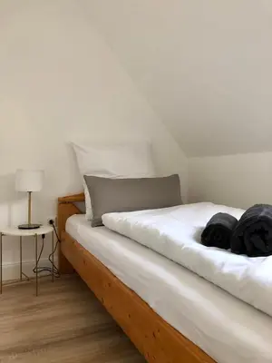 Ein Bett oder Betten in einem Zimmer der Unterkunft Haus Mosel Tales in Cochem für bis zu 9 Personen