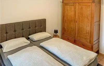 Ein Bett oder Betten in einem Zimmer der Unterkunft Stunning Home In Nimsreuland With Wifi