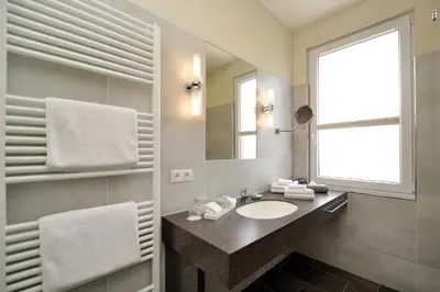 Ein Badezimmer in der Unterkunft Hotel Villa Sanct Peter