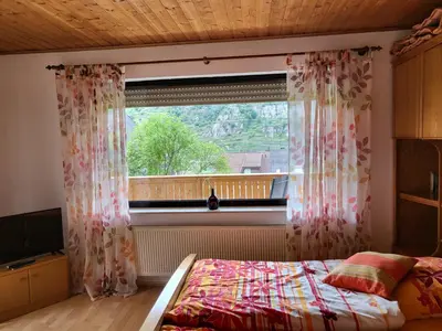 Ein Bett oder Betten in einem Zimmer der Unterkunft Ferienwohnung zum Rheinblick