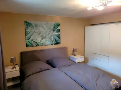 Ein Bett oder Betten in einem Zimmer der Unterkunft Ruhiges Studio I Nähe WHU I WLAN