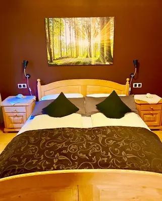Ein Bett oder Betten in einem Zimmer der Unterkunft Landgasthaus Alter Posthof