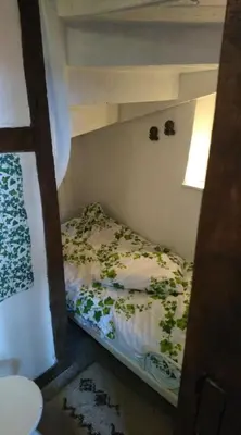 Ein Bett oder Betten in einem Zimmer der Unterkunft Alte Schule Kirmutscheid