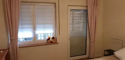 Ein Bett oder Betten in einem Zimmer der Unterkunft Ferienwohnung Kell am See