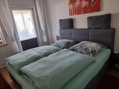 Ein Bett oder Betten in einem Zimmer der Unterkunft Ferienwohnung Kell am See