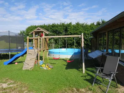 Ein Kinderspielbereich in der Unterkunft Apartment Dreser by Interhome