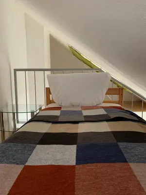 Ein Bett oder Betten in einem Zimmer der Unterkunft Augusta Trarbach