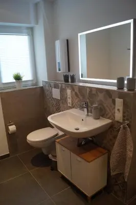 Ein Badezimmer in der Unterkunft Auszeit am Maar - Ferienwohnung
