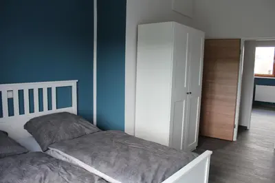 Ein Bett oder Betten in einem Zimmer der Unterkunft FeWo Krämer