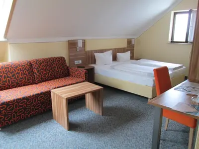 Ein Bett oder Betten in einem Zimmer der Unterkunft Landhotel Karrenberg