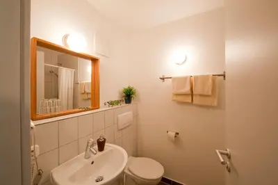Ein Badezimmer in der Unterkunft Hotel Vicinity