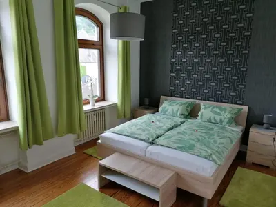 Ein Bett oder Betten in einem Zimmer der Unterkunft Mosel-Ferienwohnung Bewo