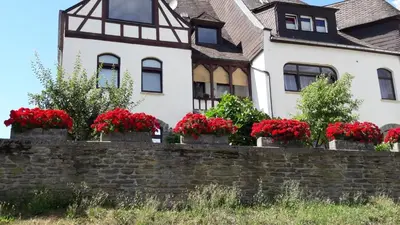 Ein Garten an der Unterkunft Mosel-Ferienwohnung Bewo