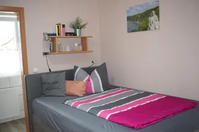 Ein Bett oder Betten in einem Zimmer der Unterkunft Marktstübchen, Einzelzimmer