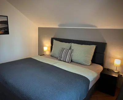 Ein Bett oder Betten in einem Zimmer der Unterkunft Maarträumchen