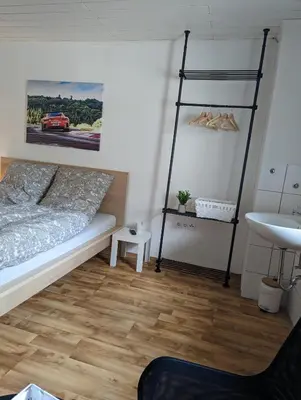 Ein Bett oder Betten in einem Zimmer der Unterkunft Pension Larifari