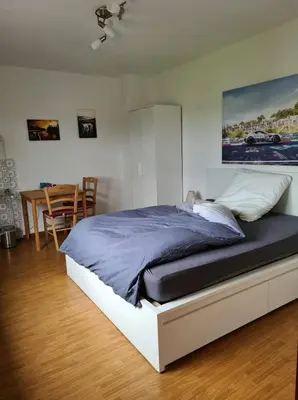 Ein Bett oder Betten in einem Zimmer der Unterkunft Pension Larifari
