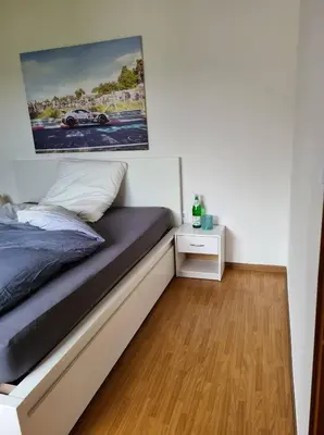 Ein Bett oder Betten in einem Zimmer der Unterkunft Pension Larifari