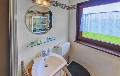 Ein Badezimmer in der Unterkunft Ferienhaus 1 In Thalfang